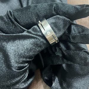 Movado Men’s stainless steel band with solitaire diamond